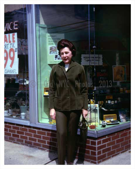 Woman posing outside a Kodak Photo Store in the 1966 Old Vintage Photos and Images