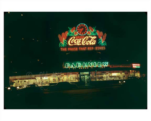 A classic Coca Cola Neon Sign Lighting up Manhattan 1955 NYC Old Vintage Photos and Images