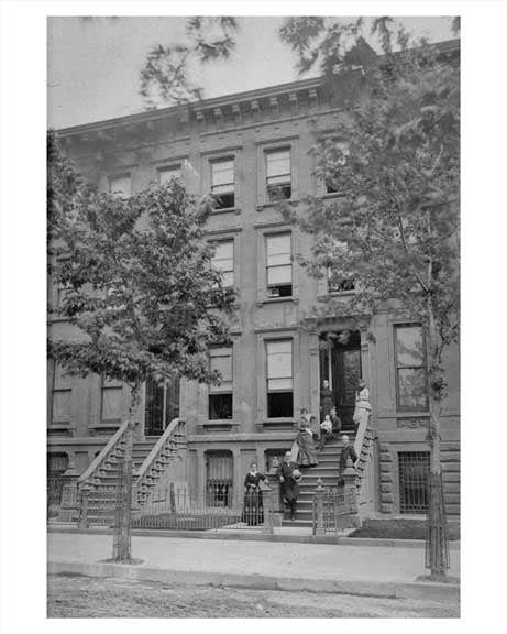 A family poses outside their building in Fort Greene Brooklyn Old Vintage Photos and Images