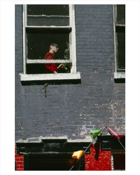 A lady in the window in a Greenwich Village 1965 Downtown Manhattan Old Vintage Photos and Images