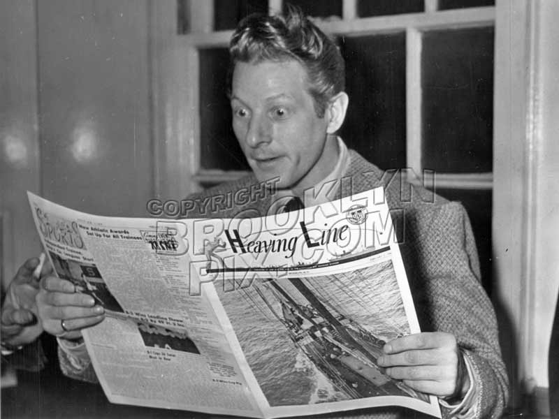 Actor Danny Kaye reading copy of The Heaving Line, during WWII Old Vintage Photos and Images