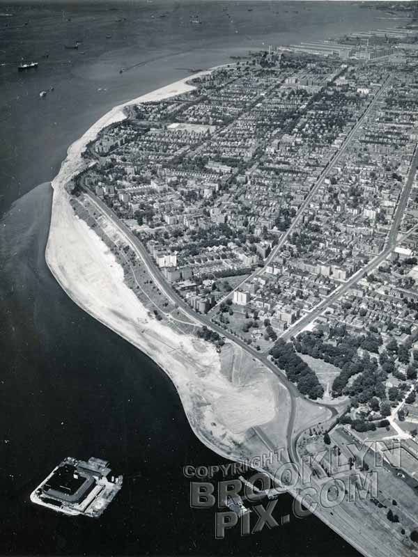 Aerial view of Bay Ridge, showing landfill behind new bulkhead. Fort Lafayette in bay, 1937