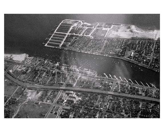 Aerial view of Sheepshead Bay 1940s with the Belt Pkwy running along side it- Brooklyn, NY Old Vintage Photos and Images