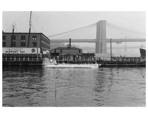 "Ben Franklin" submerged in the harbor at the South Street Seaport with the Brooklyn Bridge in the Background 1969 Old Vintage Photos and Images