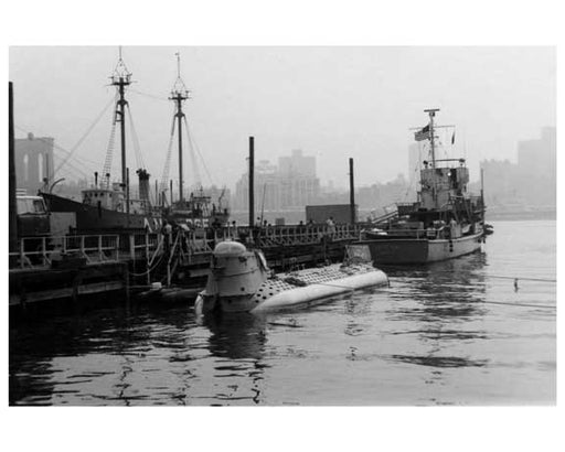 "Ben Franklin" submerged in the harbor at the South Street Seaport with the Brooklyn Bridge in the Background 1969 Old Vintage Photos and Images