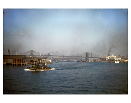 boat passing in front of Manhattan & Brooklyn bridges Old Vintage Photos and Images