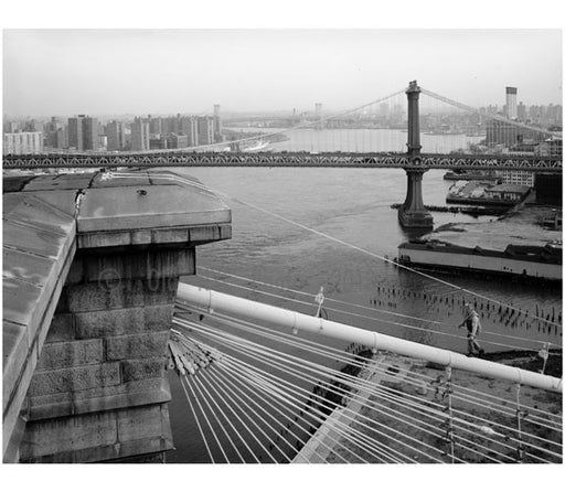 Brooklyn Bridge - View from the top of Brookltn Tower - showing man walkingup the main cable & the Manhattan bridge behind - 1982 Old Vintage Photos and Images