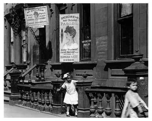 Children playing on Lexington Avenue & 104th Street outside of a "Hair Dressing Parlor" 1911 - Upper East Side, Manhattan - NYC Old Vintage Photos and Images