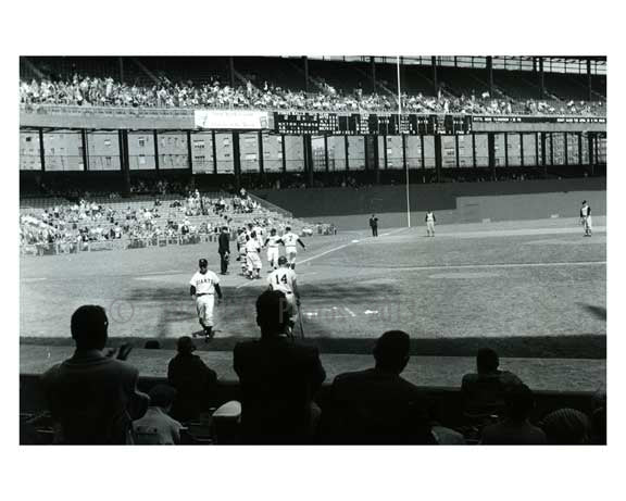 Early 1950's game at the Polo Grounds - some empty seats