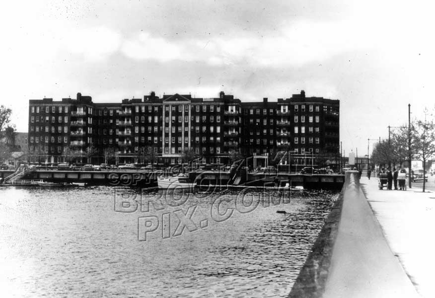 Emmons Ave. looking west showing apartment houses on Shore Blvd, former LIRR station location, 1940s Old Vintage Photos and Images