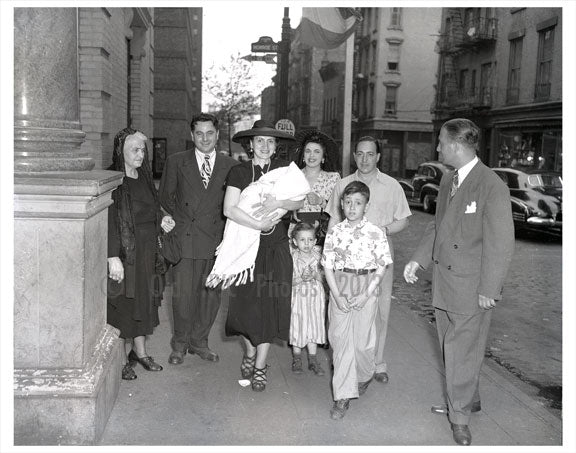 Family gathered on the corner of Monroe St.