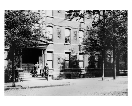 Family on Bed-Stuy Building Steps
