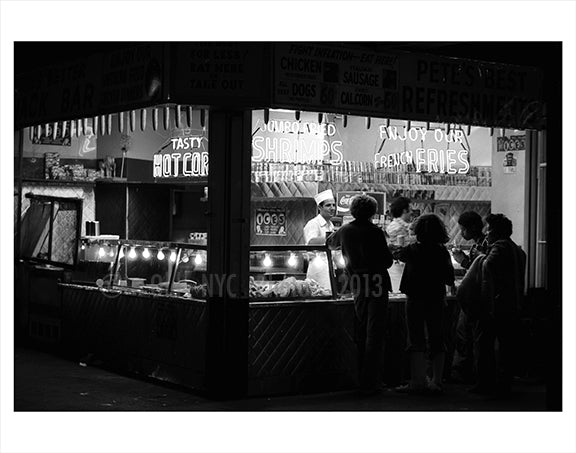 food vendor at night on the boardwalk Old Vintage Photos and Images