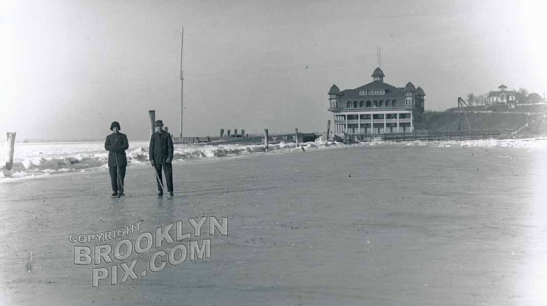 Ice hockey at foot of 82nd Street, Crescent Athletic Club in distance, 1912