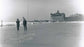 Ice hockey at foot of 82nd Street, Crescent Athletic Club in distance, 1912