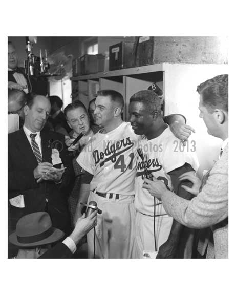 Jackie Robinson in the Dodger Locker Room with Reporters World Series 1956