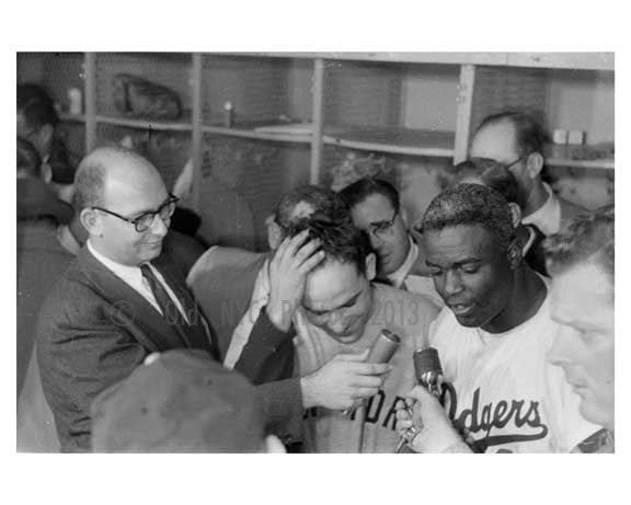 Jackie Robinson & Yogi Berra getting interviewed in the dug out after World Series Game at  Ebbets Field 1956 - Brooklyn NY