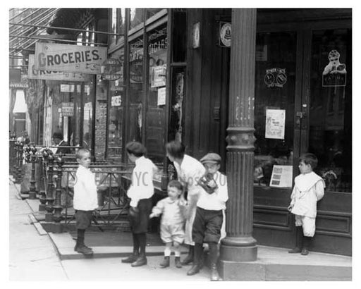 Kids playing on the corner of Greenwich Street - Manhattan - NYC 1914 Old Vintage Photos and Images