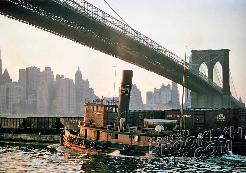 Lackawanna Railroad tugboat moving freight cars under Brooklyn Bridge, c.1950 Old Vintage Photos and Images