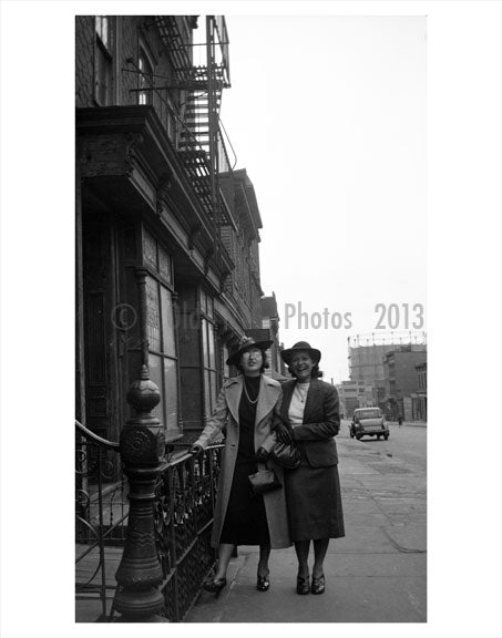 Ladies walking along the sidewalk 1940s Old Vintage Photos and Images