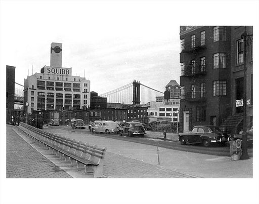 Manhattan Bridge behind buildings as seen from DUMBO Brooklyn NY Old Vintage Photos and Images