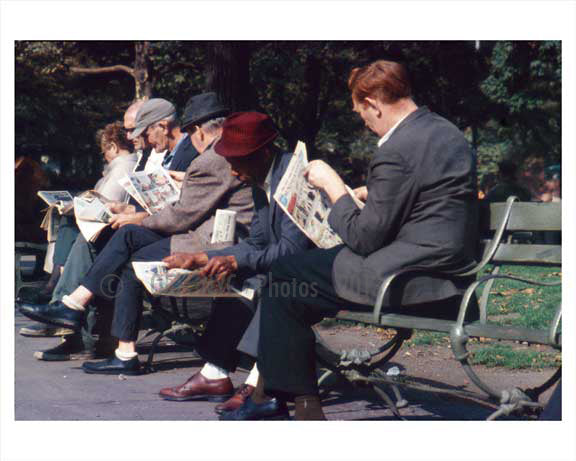 Men line the benches, reading the Sunday paper in Central Park - Manhattan 1965 NYC Old Vintage Photos and Images