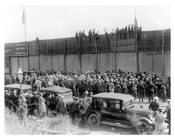 Men trying to get a glimpse of the game over the fence Ebbets Field  - Flatbush - Brooklyn NY