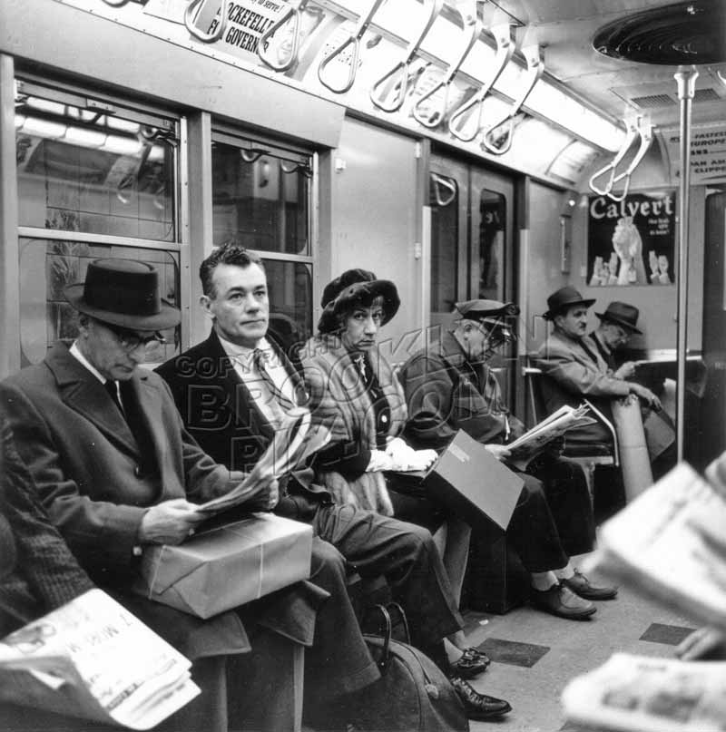 Morning commuters reading the news, c.1955 Manhattan Old Vintage Photos and Images