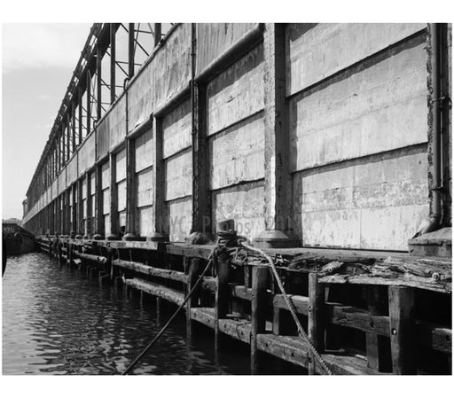 New York Barge Canal, Gowanus  Bay Terminal Pier - view of east side cargo doors and cargo mast system Old Vintage Photos and Images