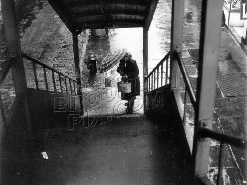 Out of the rain and up the stairs, c.1955 Old Vintage Photos and Images