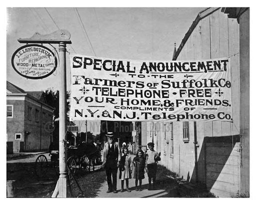 Patchogue LI - sign advertising free telephone calls for farmers - 1915 Old Vintage Photos and Images