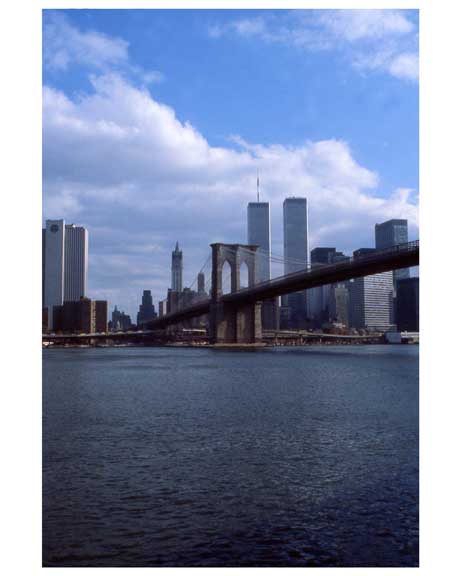 Skyline of Manhattan with the Brooklyn Bridge & The Twin Towers behind