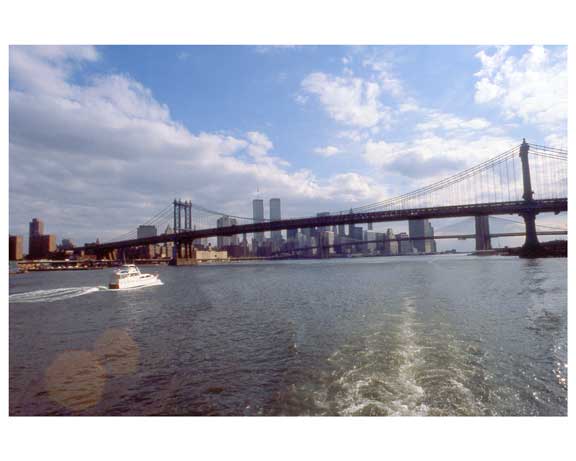 Skyline of Manhattan with the Manhattan Bridge in the foreground & The Twin Towers behind