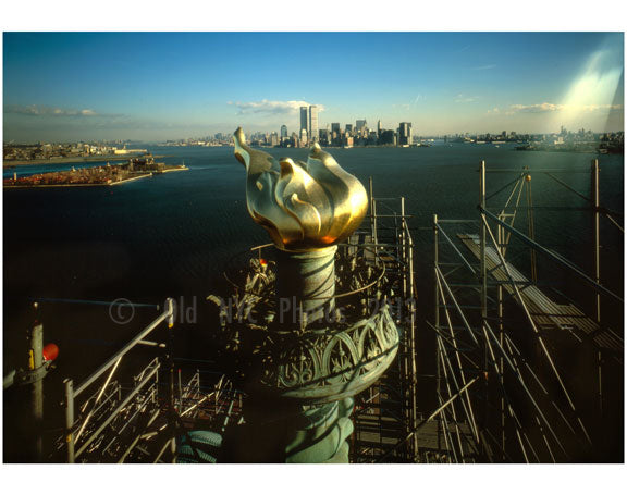 Statue of Liberty - new Torch & Flame with Manhattan Skyline in background Old Vintage Photos and Images