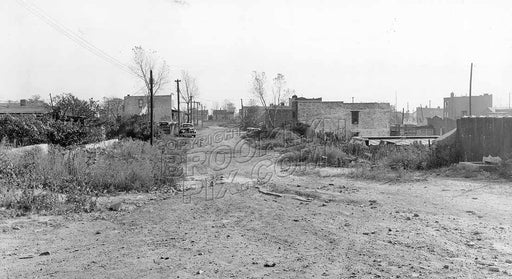 Still unpaved Grant Avenue looking south from Sutter Avenue, 1940 Old Vintage Photos and Images