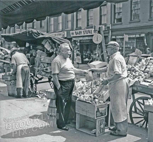 Street peddler making a sale on Bleecker street at Morton, 1955 Old Vintage Photos and Images