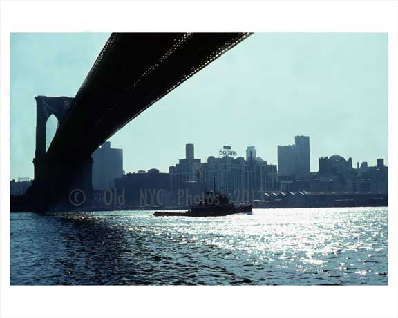 Tug boat passing infront of the Brooklyn Bridge 1960 NYC Old Vintage Photos and Images