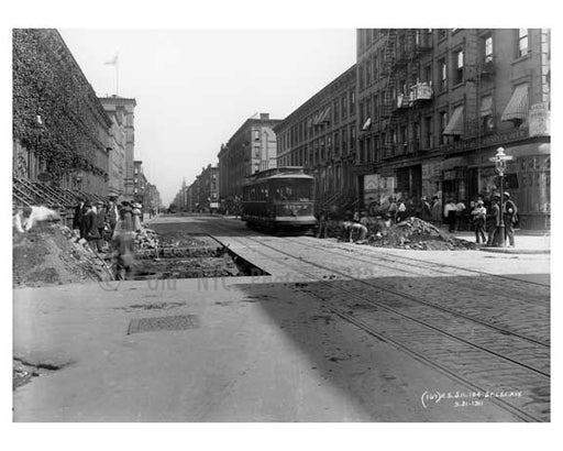 Upclose view of construction & a trolley passing down Lexington Avenue & 104th Street 1911 - Upper East Side, Manhattan - NYC Old Vintage Photos and Images