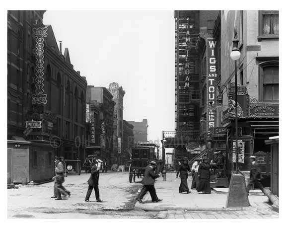 Upclose view of people walking in the middle of the street 7th Avenue between 40th & 41st Streets  - Midtown Manhattan - 1915 Old Vintage Photos and Images