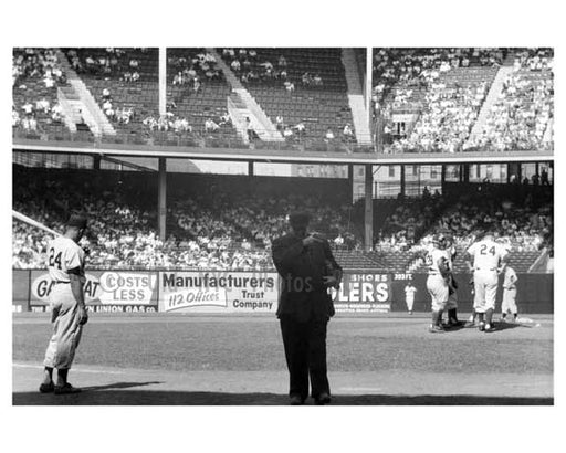 Willie Mays at bat - Dodgers pitching conference at Ebbets Field 1957 2
