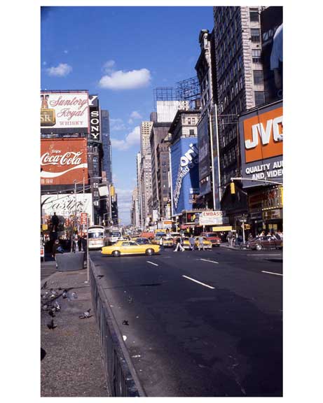 Yellow cabs pass through 1970s Times Square Old Vintage Photos and Images